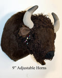 Faux Taxidermy buffalo head with adjustable 9" horns on a white background