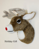 Plush white tail deer head with a red nose on a white background, labeled 'Holiday Gift'.
