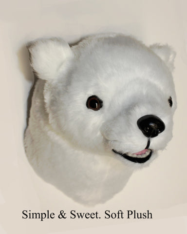 Plush polar bear head on a white background with text 'Simple & Sweet. Soft Plush'.